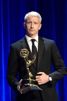 Anderson Cooper winning an Emmy in 2006 (http://thoroughlyandersoncooper.blogspot.com/2009/09/2009-emmys.html)